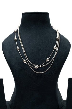 Nugget Layer Necklace – silver triple-layer necklace with spaced oval nugget beads